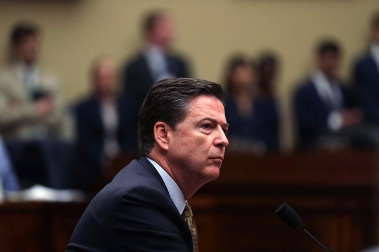 Former law enforcement officials say FBI boss James Comey is going nowhere despite criticism over the agency relaunching an email probe into Hillary Clinton