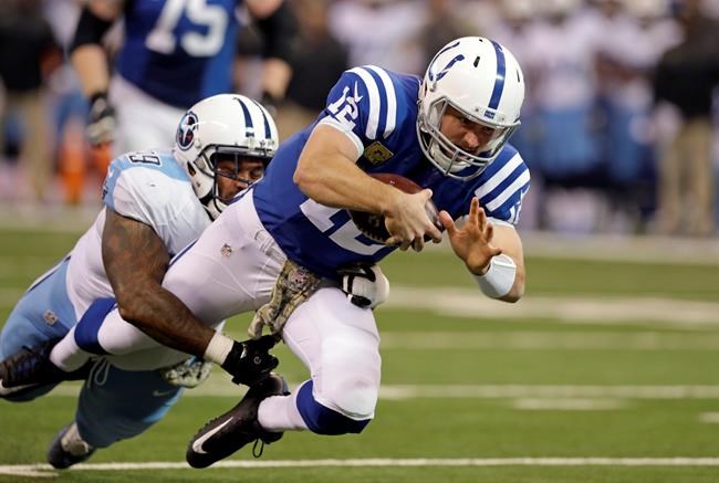 Indianapolis Colts quarterback Andrew Luck is tackled by Tennessee Titans defensive tackle Jurrell Casey during the first half of an NFL football game in Indianapolis Sunday Nov. 20 2016