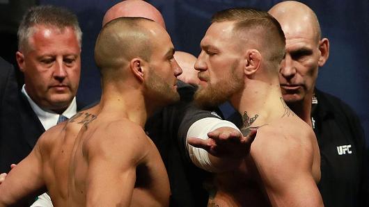 UFC president Dana White seperates UFC Featherweight Champion Conor Mc Gregor of Ireland and UFC Lightweight Champion Eddie Alvarez during UFC 205 Weigh-ins at Madison Square Garden