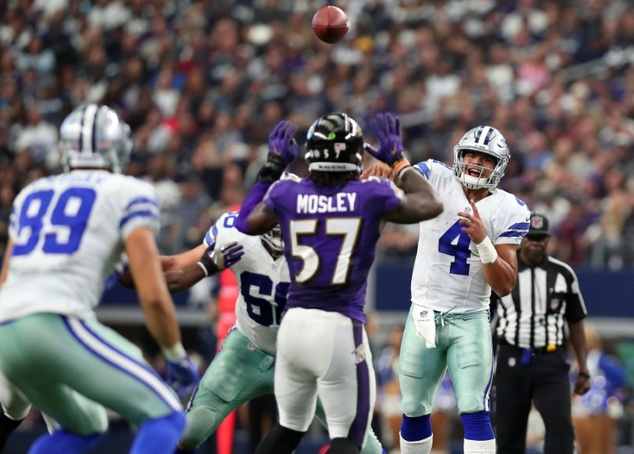 Dak Prescott throws a pass to Gavin Escobar of the Dallas Cowboys during the second half against the Baltimore Ravens