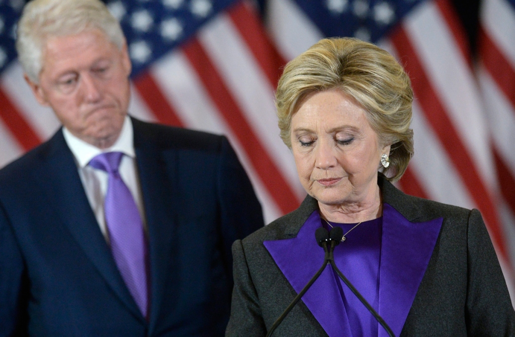 Democractic presidential candidate Hillary Clinton delivers her concession speech next to her husband former US president Bill Clinton, at the New Yorker Hotel's Grand Ballroom in New York city, New York USA 09 November 2016. EPA  Olivier Doulie