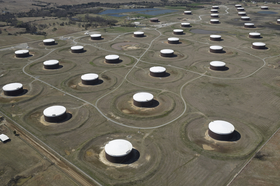 Crude oil storage tanks are seen from above at the Cushing oil hub in Cushing Oklahoma