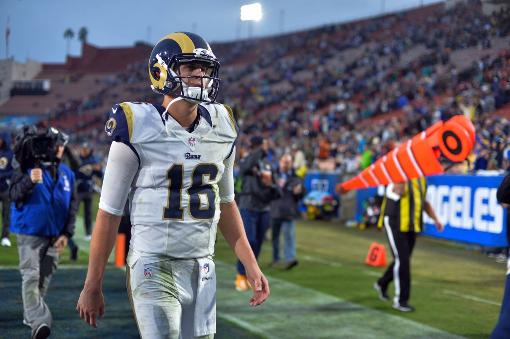 Nov 20 2016 Los Angeles CA USA Los Angeles Rams quarterback Jared Goff walks off the field after the Miami Dolphins scored a 14-10 come from behind win over the Rams at Los Angeles Memorial Coliseum. Goff started his first NFL game. Mandatory C