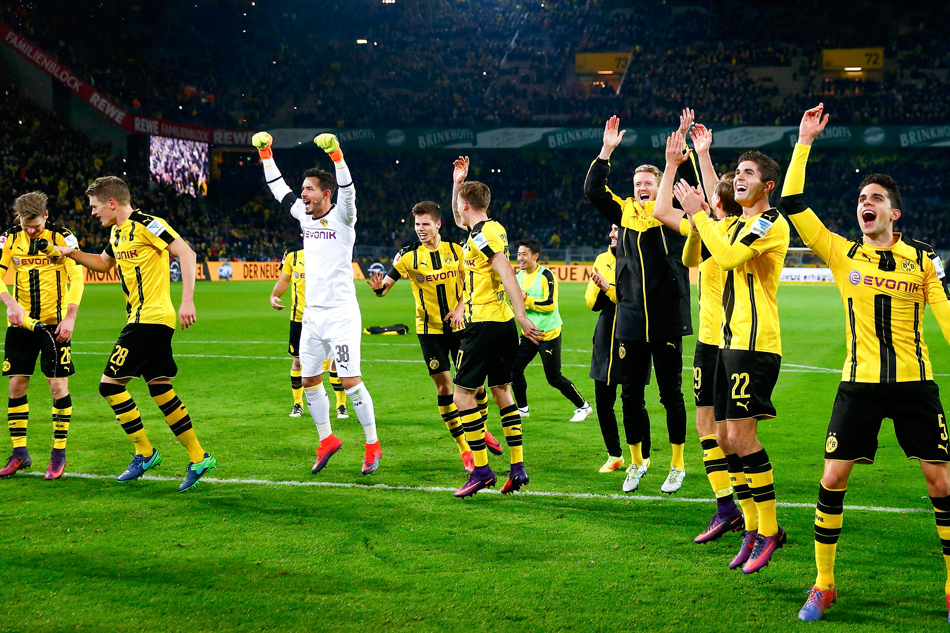 Dortmund players react after the match