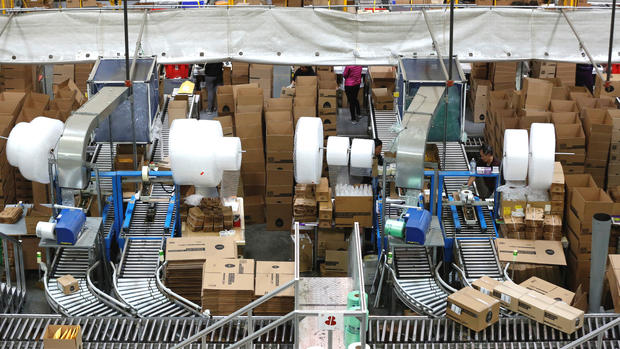 Employees prepare items for shipping at the Newegg warehouse on Cyber Monday in City of Industry Calif. Nov. 28 2016. REUTERS  Mario Anzuoni