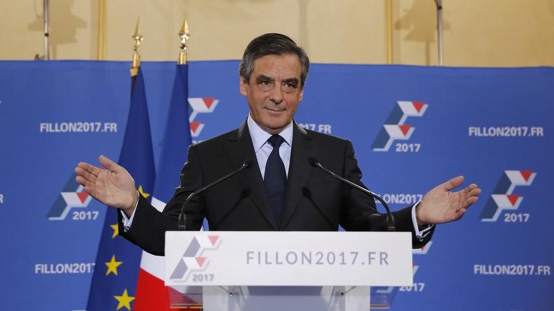 Francois Fillon former French prime minister and member of Les Republicains political party reacts as he delivers his speech after partial results in the second round for the French center-right presidential primary election in Paris France November 2