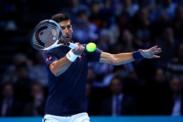 Novak Djokovic of Serbia hits a forehand