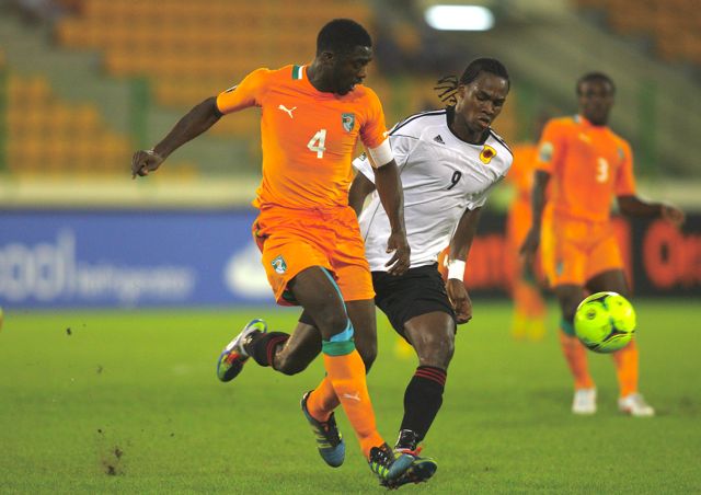 Kolo Toure in action for the Ivory Coast against Angola at the African Cup of Nations