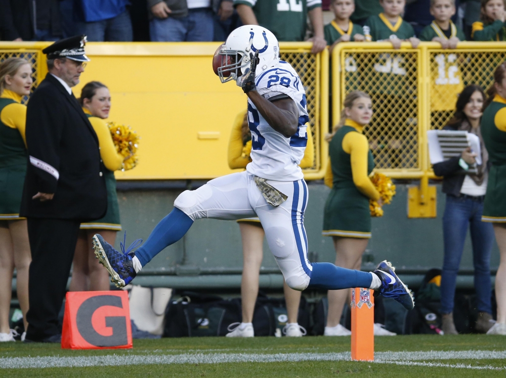 Jordan Todman returned the opening kickoff for a touchdown and the Colts were off and running toward a victory over the Packers on Sunday in Green Bay Wisconsin