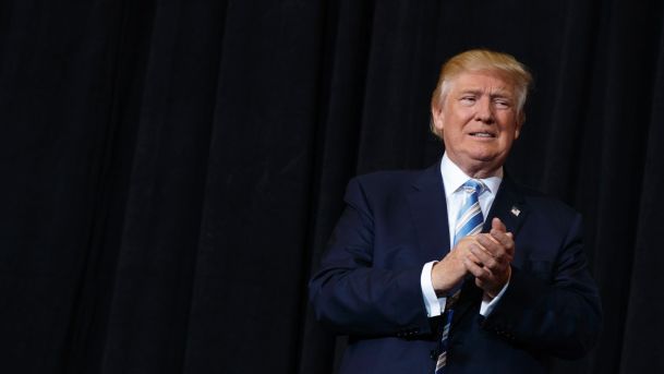 Donald Trump arrives to speak at a campaign rally in Sarasota Fla