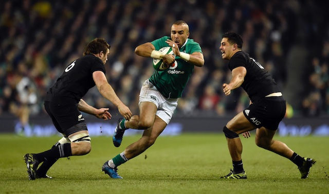 Ireland's Simon Zebo in action with New Zealand's Anton Lienert Brown and Liam Squire. Reuters