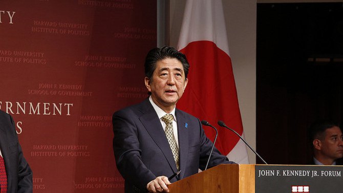 Japanese Prime Minister Shinzo Abe and US President-elect Donald Trump. Composite File