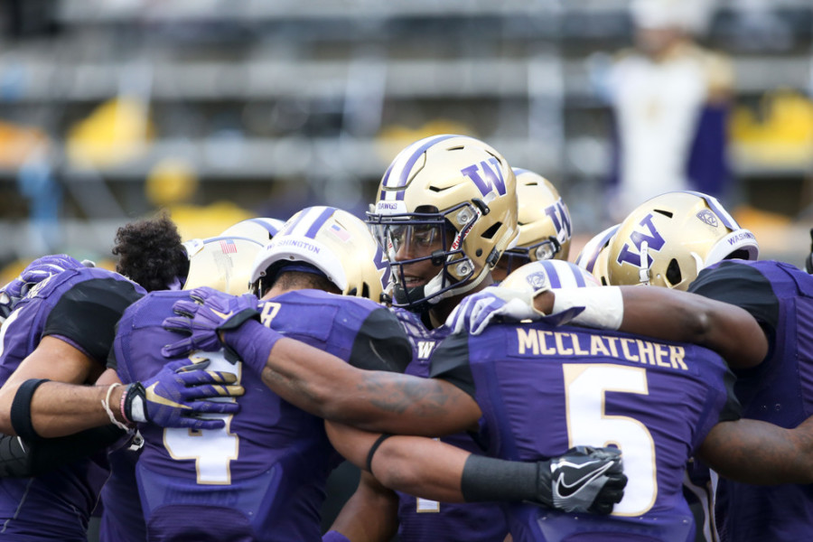 SEATTLE WA- NOVEMBER 19 Washington's John Ross leads his teammates in a pre-game cheer in the end zone. Washington defeated Arizona State 44-18