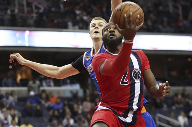 Wizards catch fire from deep hold on to beat Knicks and snap three-game slide