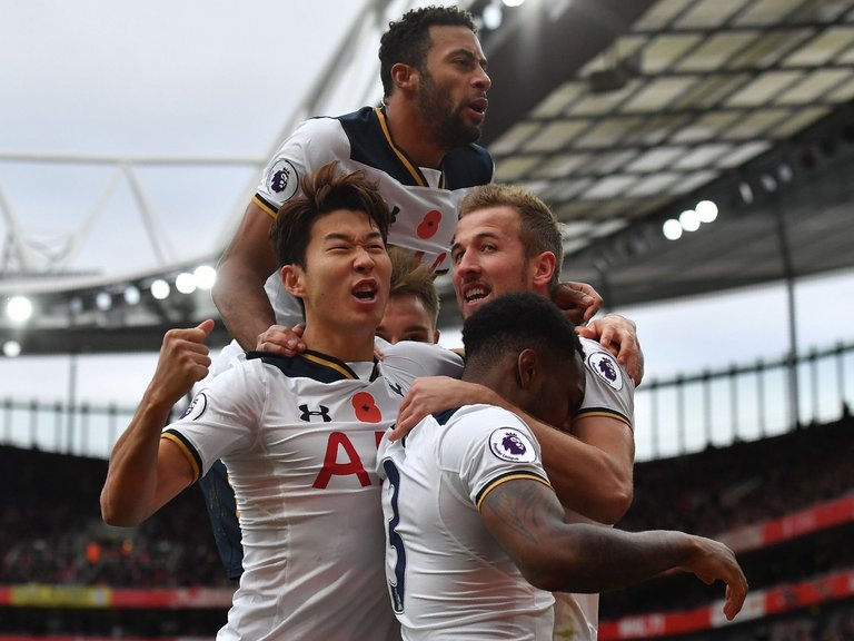 Harry Kane is congratulated after scoring