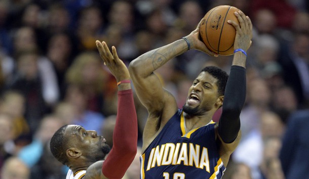 Feb 29 2016 Cleveland OH USA Indiana Pacers forward Paul George shoots against Cleveland Cavaliers forward Le Bron James in the second quarter at Quicken Loans Arena