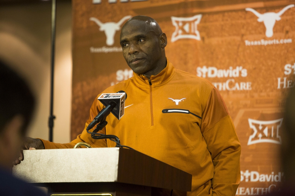 Longhorn football coach Charlie Strong at a press conference following the team's overtime loss against Kansas