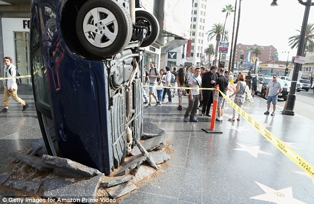 Making an impact Ahead of the show's launch on Friday a car was'crashed into the ground at the Hollywood Walk of Fame