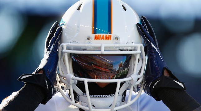 FOXBORO MA- DECEMBER 14 Jarvis Landry #14 of the Miami Dolphins warms up before a game against the New England Patriots at Gillette Stadium