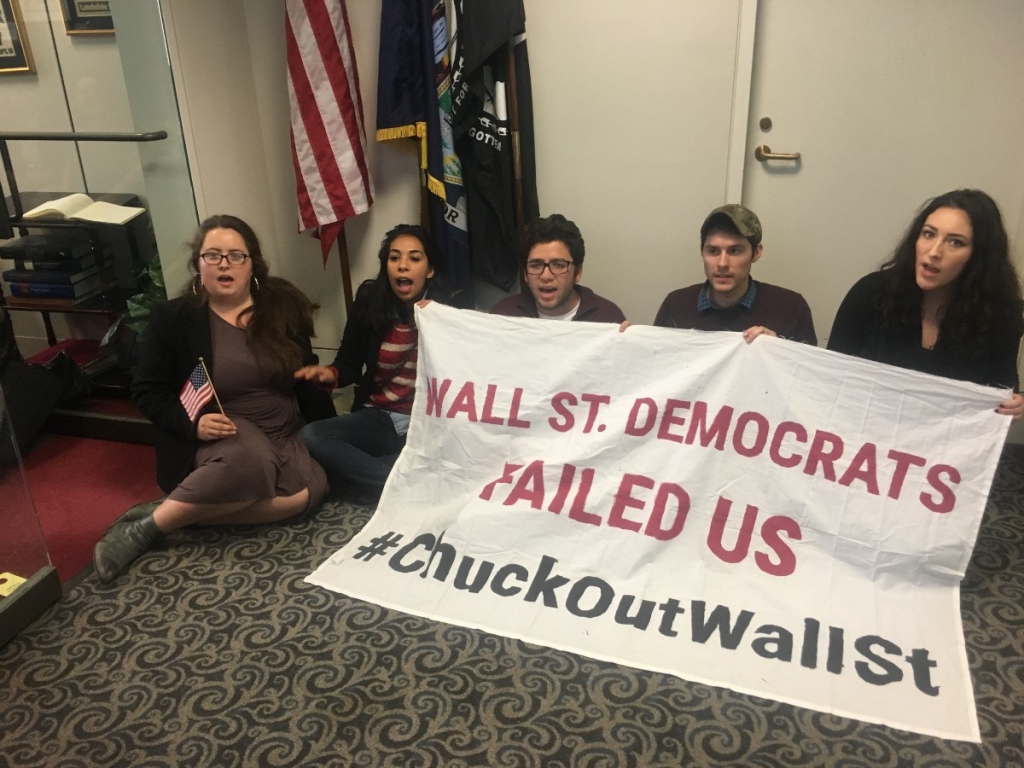 Millennials with Allof Us2016 demand that Sen. Chuck Schumer step aside to allow for new Democratic leadership. CREDIT Kira Lerner