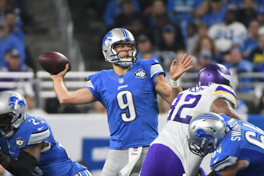 DETROIT MI- NOVEMBER 24 Detroit Lions quarterback Matthew Stafford throws deep during the NFL football game between the Minnesota Vikings and Detroit Lions on Thanksgiving Day