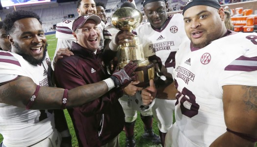 Dan Mullen and the Bulldogs celebrate with Golden Egg trophy