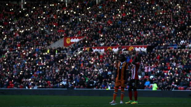 Mobile phones lit up as darkness descended on the Stadium of Light