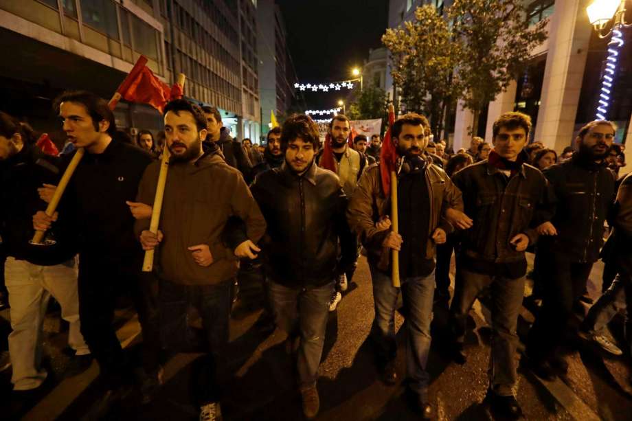 Leftist demonstrators march in protest against the visit of US President Barack Obama in Athens Tuesday Nov. 15 2016. Obama is in Athens for talks with the country's political leadership and is scheduled to deliver a speech on Wednesday before heading