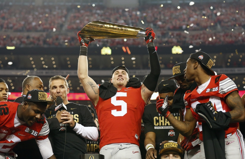 Jan 12 2015 Arlington TX USA Ohio State Buckeyes tight end Jeff Heuerman hoists the College Football Playoff trophy after the game against Oregon Ducks in the 2015 CFP National Championship Game at AT&T Stadium. Mandatory Credit Matthew Emmons-U