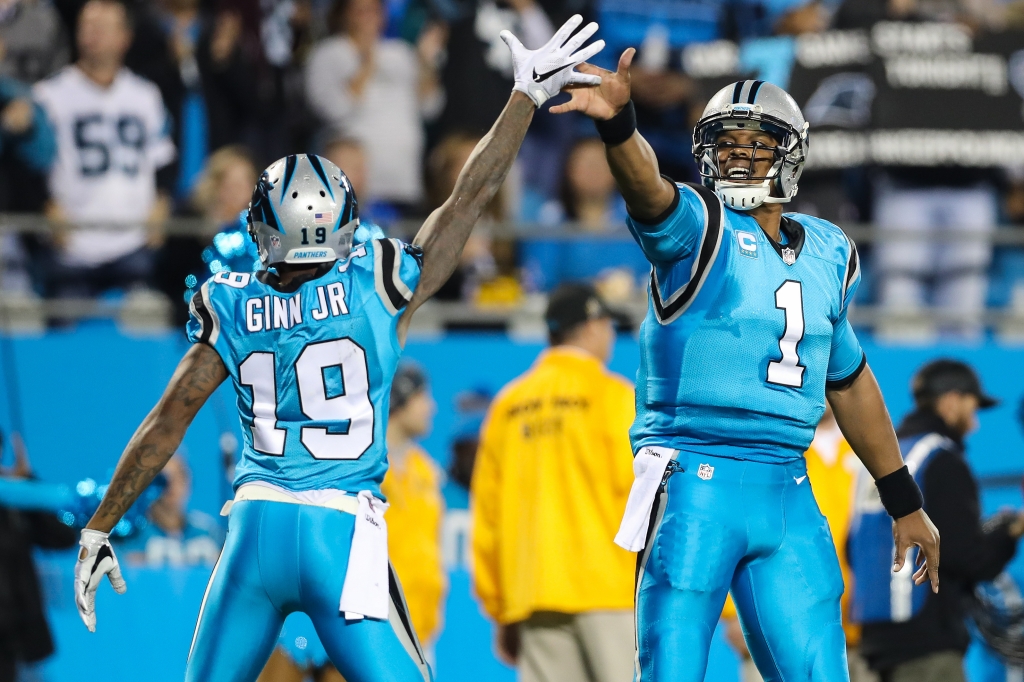 CHARLOTTE NC- NOVEMBER 17 Carolina Panthers quarterback Cam Newton and wide receiver Ted Ginn celebrate a his score during the first half between the Carolina Panthers and the New Orleans Saints at Bank of America Stadium