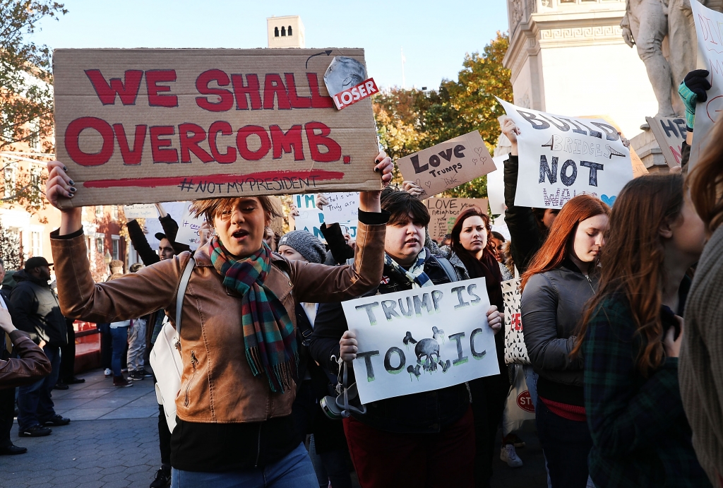 Hundreds of anti Donald Trump protesters hold a demonstration in Washington Square Park as New Yorkers react to the election of Donald Trump as president of the United States