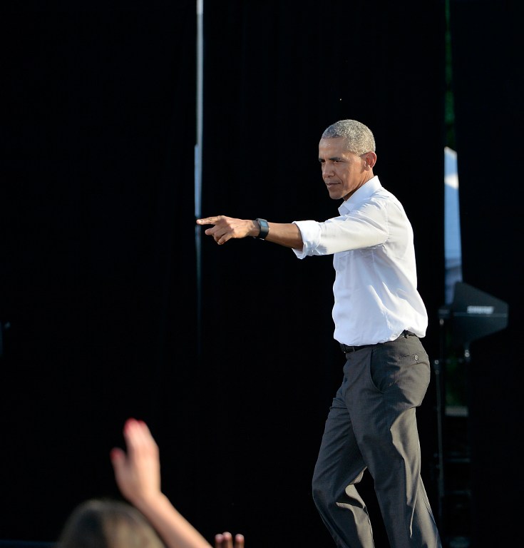 President Barack Obama points to the audience after speaking at a campaign event for Democratic presidential nominee Hillary Clinton on the campus of the University of Chapel Hill