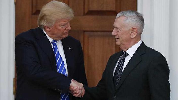 President-elect Donald Trump shakes hands with retired Marine Corps General James Mattis