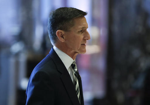 Retired Lt. Gen Michael Flynn walks through the lobby at Trump Tower Thursday Nov. 17 2016 in New York