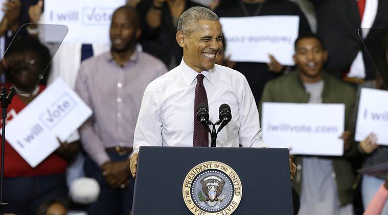 President Barack Obama smiles at the crowd while campaigning for Democratic presidential candidate Hillary Clinton Friday Nov. 4 2016 at Fayetteville State University in Fayetteville N.C