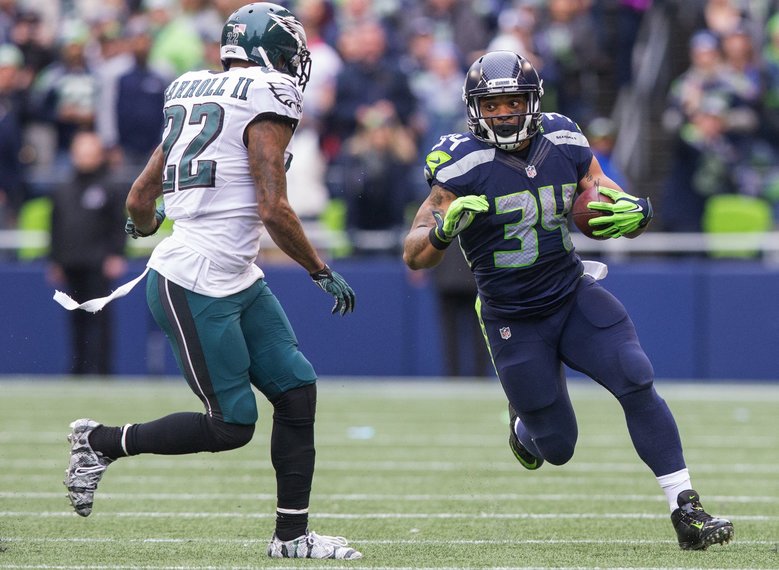 Seahawks running back Thomas Rawls makes a run during the first half