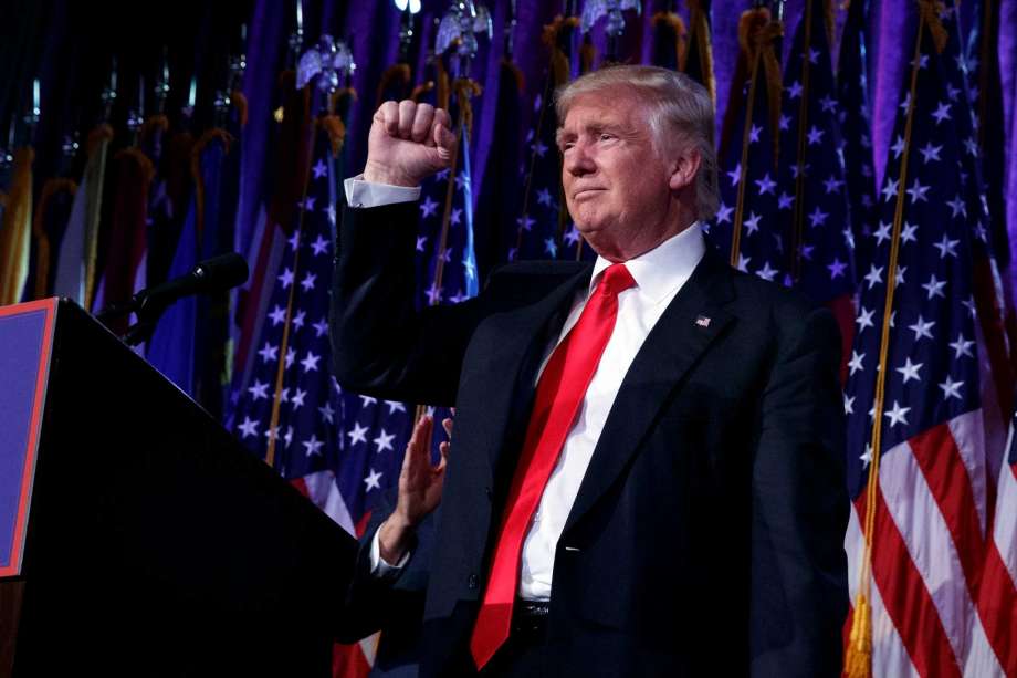 President-elect Donald Trump pumps his fist during an election night rally Wednesday Nov. 9 2016 in New York