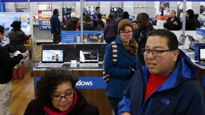 Shoppers shop at a Best Buy store in Skokie Ill. on Friday Nov. 25 2016