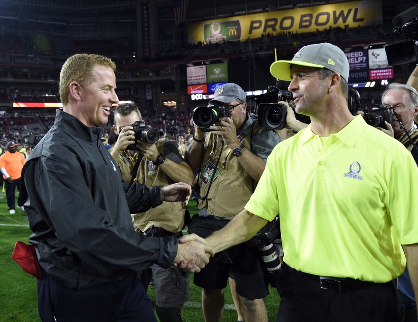 Jan 25 2015 Phoenix AZ USA Team Irvin head coach Jason Garrett of the Dallas Cowboys and Team Carter head coach John Harbaugh of the Baltimore Ravens shake hands after the 2015 Pro Bowl at University of Phoenix Stadium. Mandatory Credit Kyle Terada