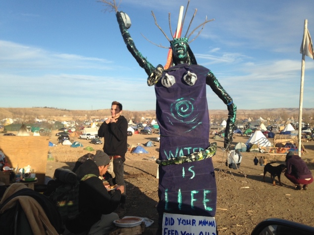 A sculpture stands at an encampment where protesters of the Dakota Access oil pipeline have been gathered for months Saturday Nov. 26 2016 near Cannon Ba