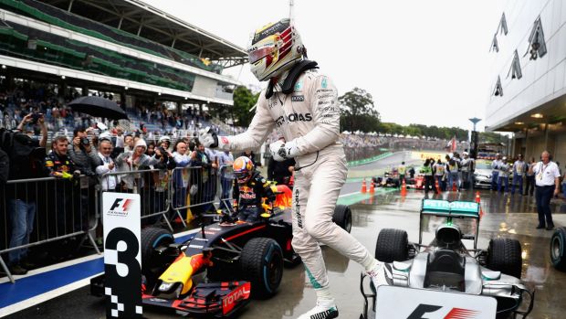 Title race still alive Lewis Hamilton celebrates winning in Brazil