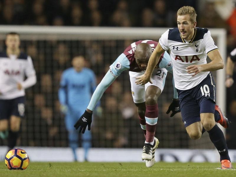 Tottenham's Harry Kane breaks away from West Ham's Angelo Ogbonna during a Premier League match