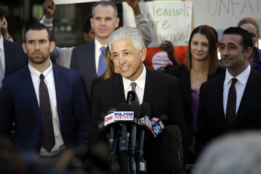 Daniel Petrocelli lead attorney for President-elect Donald Trump speaks after a hearing involving a lawsuit against the now-defunct Trump University Friday Nov. 18 2016 in San Diego. Trump agreed Friday to pay $25 million to settle several lawsuits