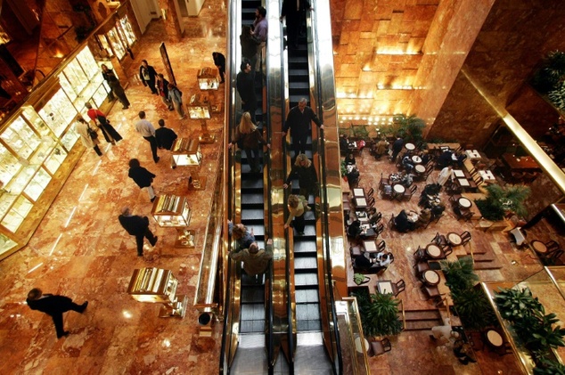 29 2004 shows shoppers and diners visiting the Trump Tower on 5th Avenue in Manhattan New York. The glass and steel skyscraper