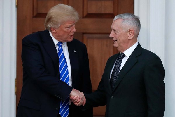 President-elect Donald Trump shakes hands with retired Marine Corps Gen. James Mattis as he leaves Trump National Golf Club Bedminster clubhouse in Bedminster N.J. Saturday Nov. 19 2016