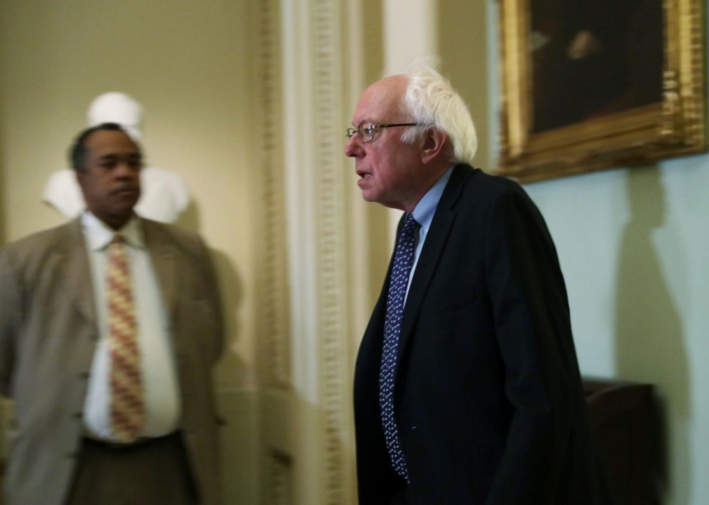 623632432-sen-bernie-sanders-arrives-at-an-election-meeting-of