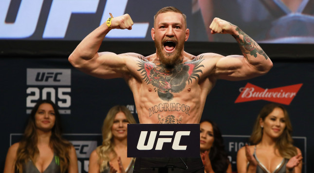 UFC Conor Mc Gregor Becomes First Simultaneous Two Belt Champ		Posted by	rynemilkins