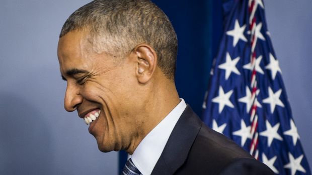 US President Barack Obama smiles during a press conference at the White House on Monday