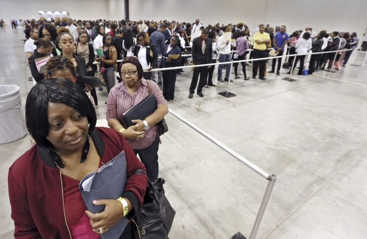 Kanockwa Horton left from Stone Mountain and Jacqueline Merritt from Atlanta stand first in line at the recent Airport Community Job Fair in Atlanta