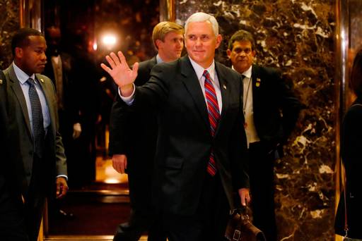 Vice president-elect Mike Pence departs Trump Tower in New York after meeting with Donald Trump